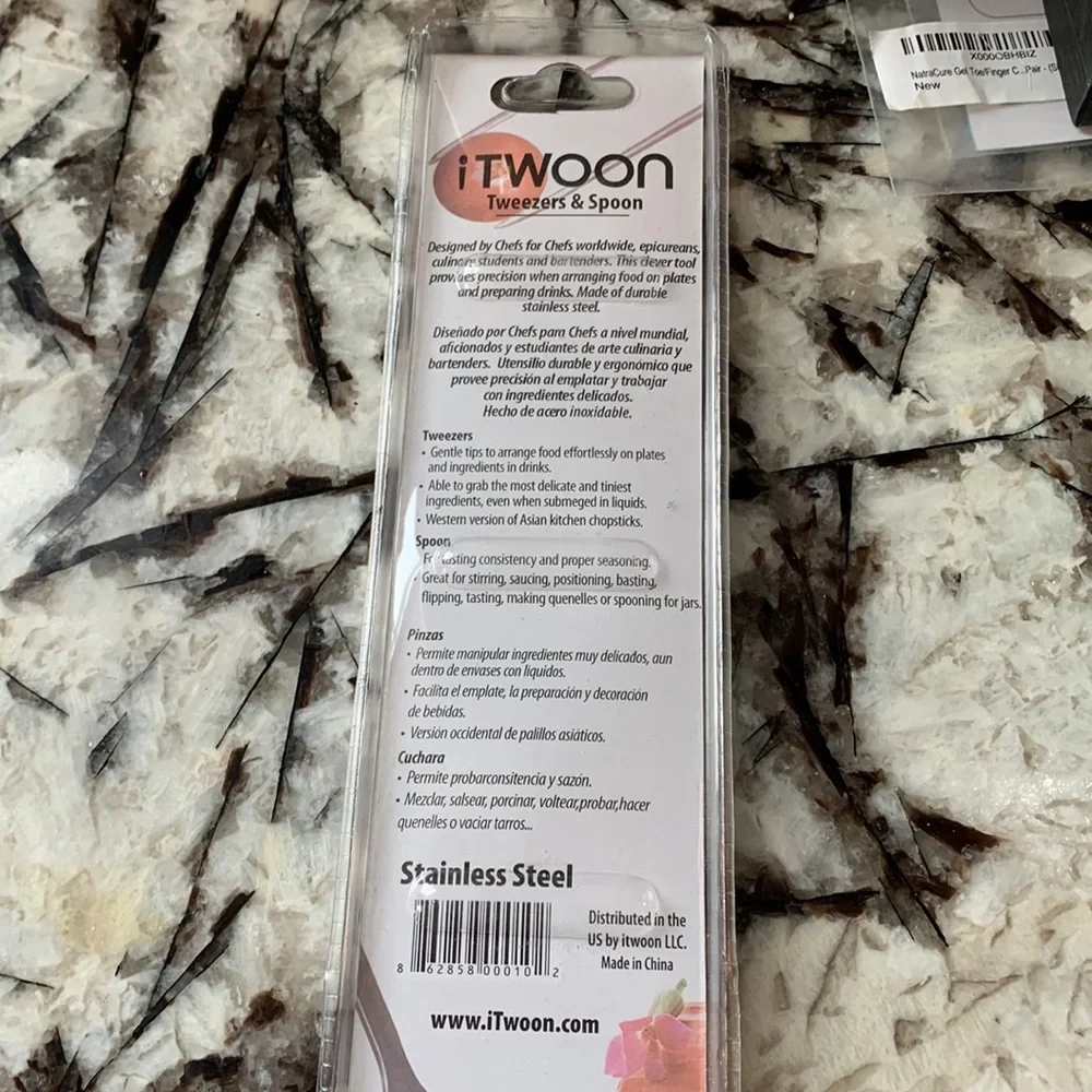 Itwoon tweezers and spoon. New‎ in package 22 retail